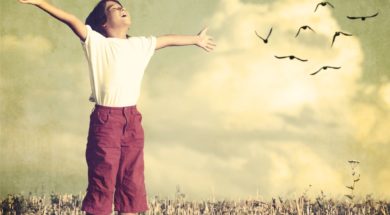 Colorized kid breathing fresh air with birds flock flying in bac