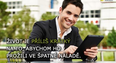 Young successful businessman with tablet outdoors