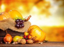 Seasonal harvested agriculture products in wooden box with blur